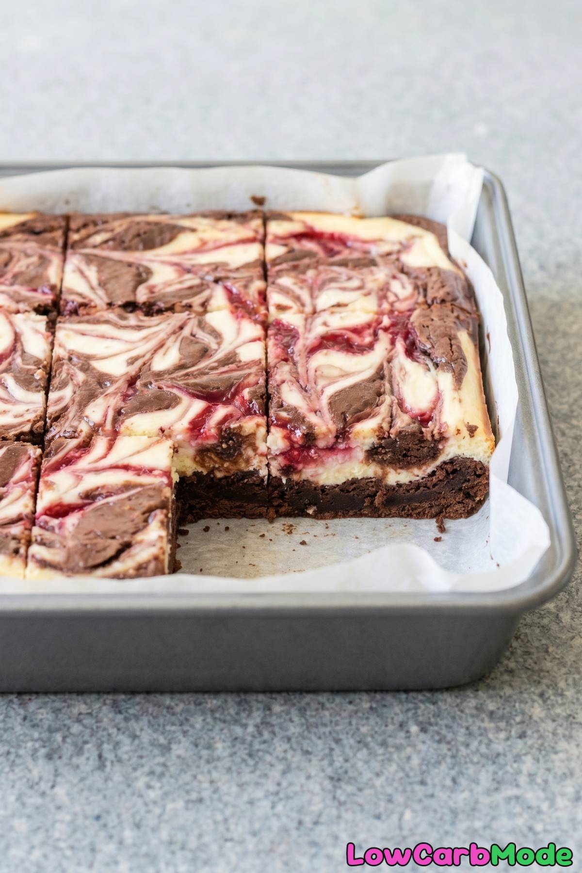 Luscious keto raspberry swirl cheesecake brownies