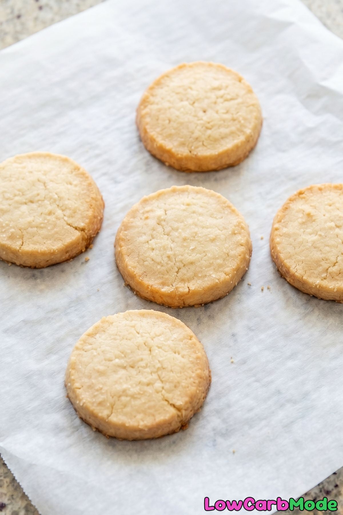 Tender keto shortbread cookies on parchment