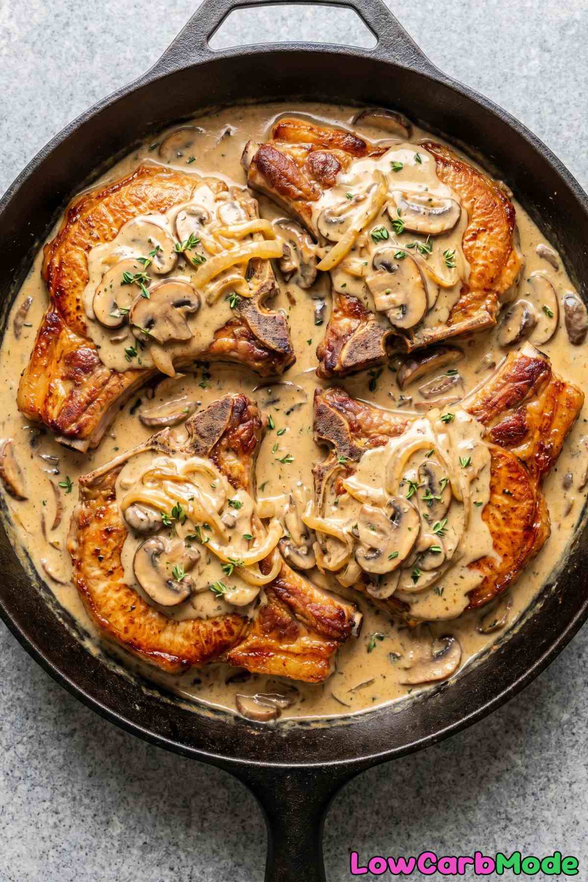 Creamy smothered pork chops on a plate