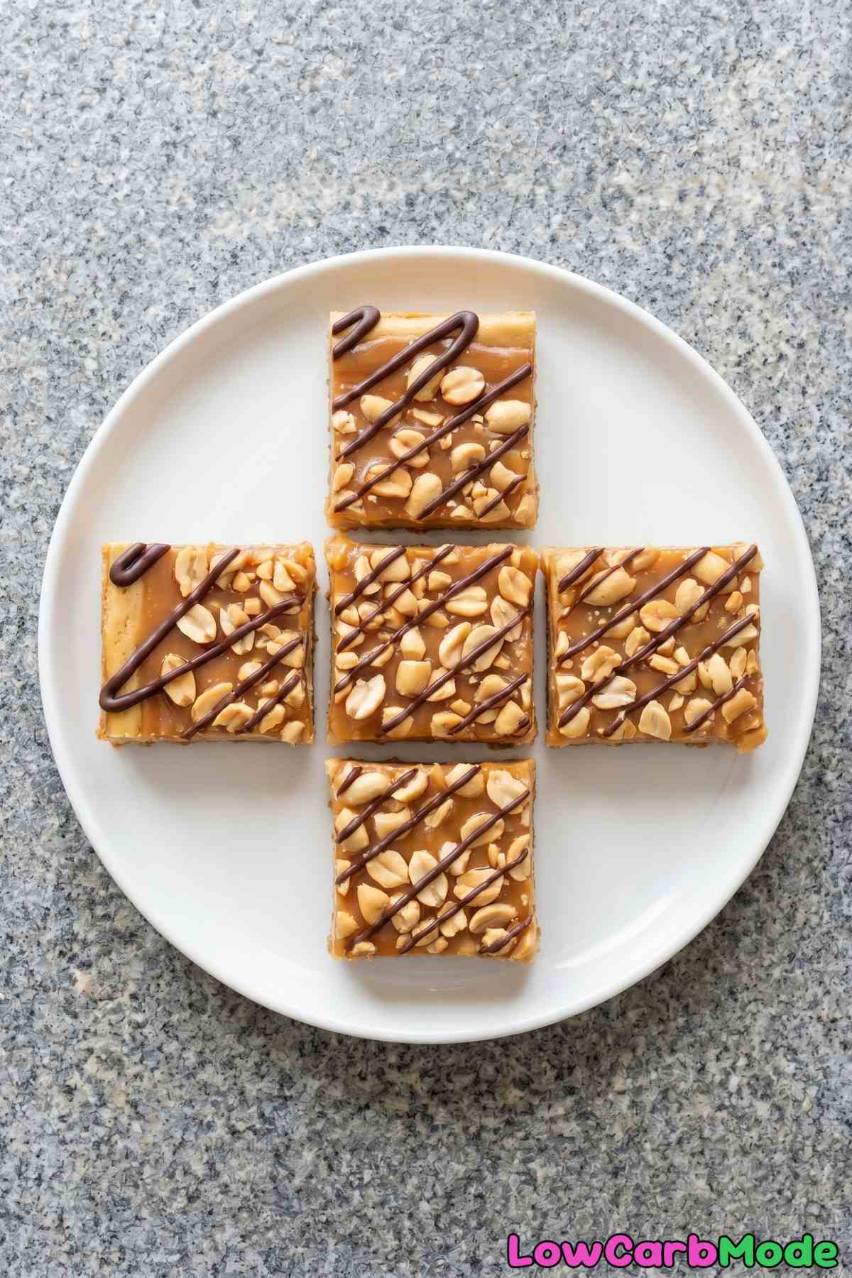 Indulgent keto Snickers cheesecake bars