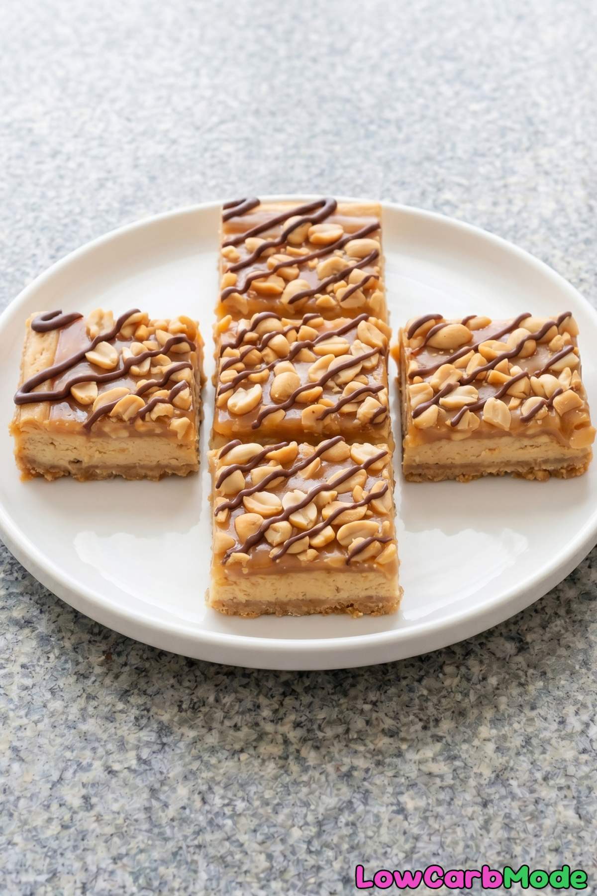 Homemade keto Snickers cheesecake bars