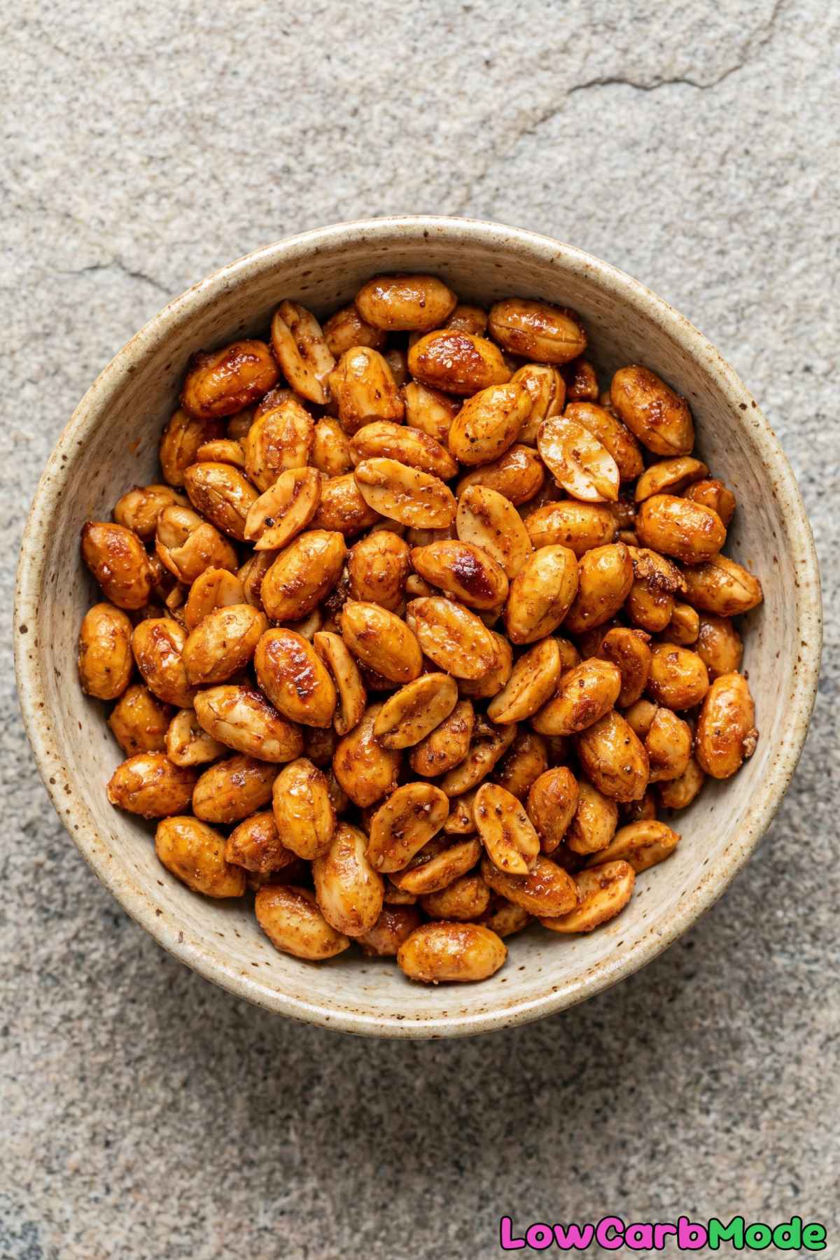 Warm keto spicy honey roasted peanuts closeup