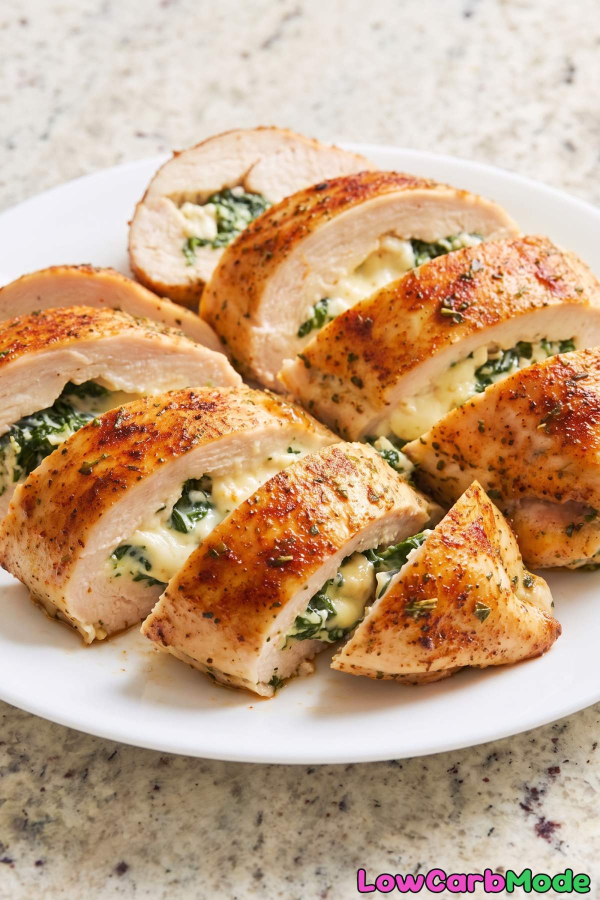 golden baked stuffed chicken with spinach
