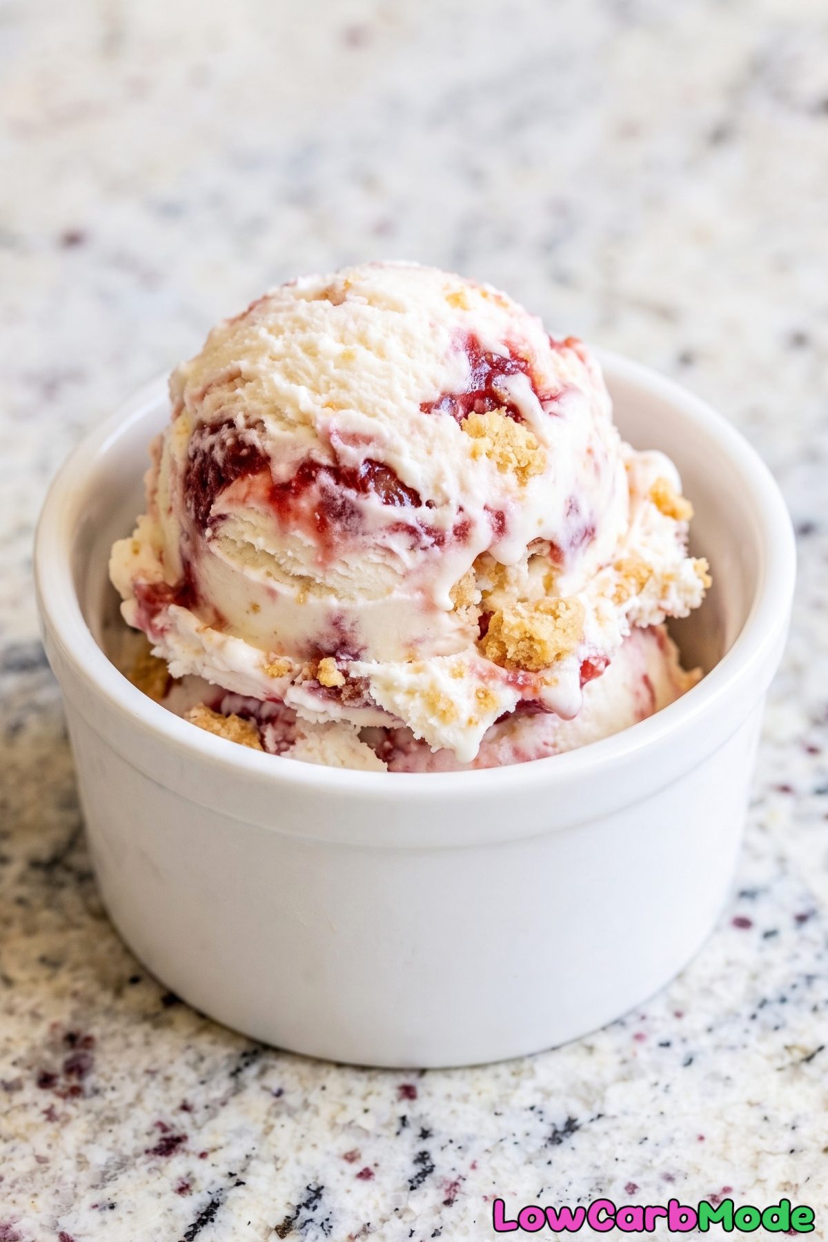 Bowl of keto strawberry cheesecake ice cream