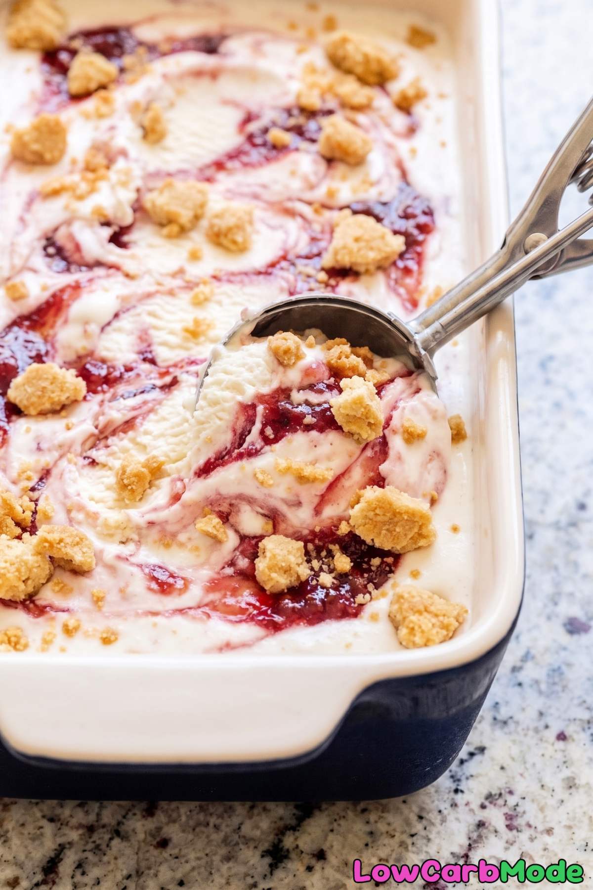 Scoop of keto strawberry cheesecake ice cream