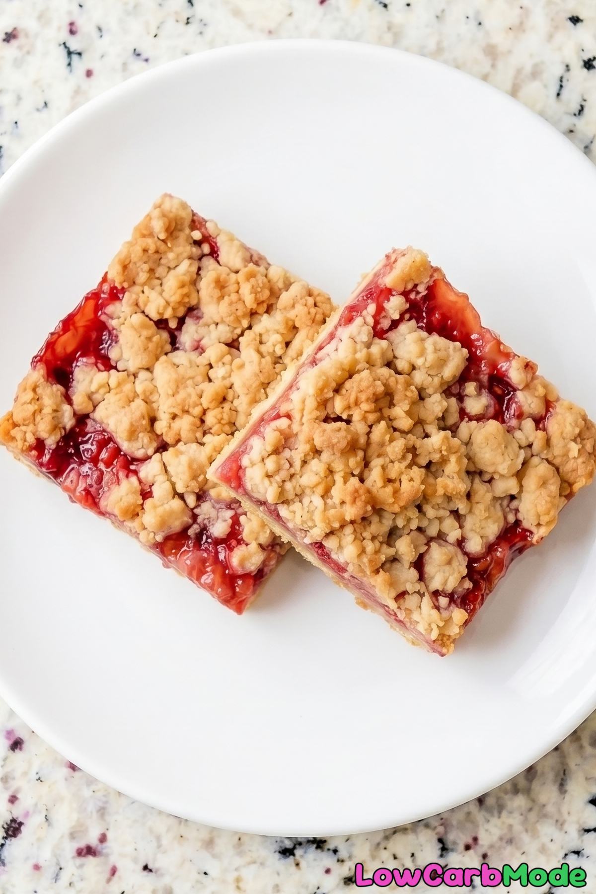 Tender keto strawberry crumble bars served