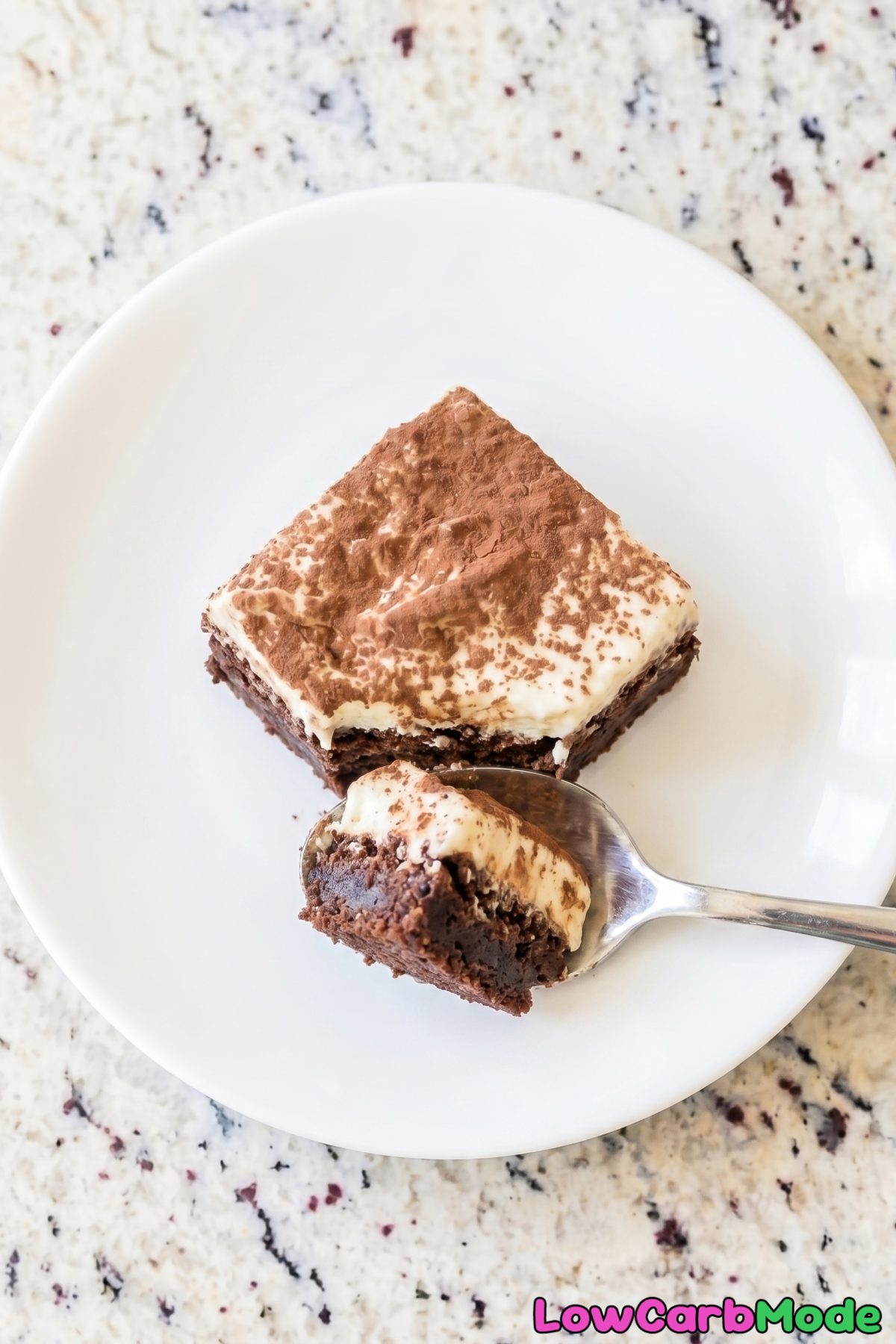 Fudgy keto tiramisu brownie bars on plate