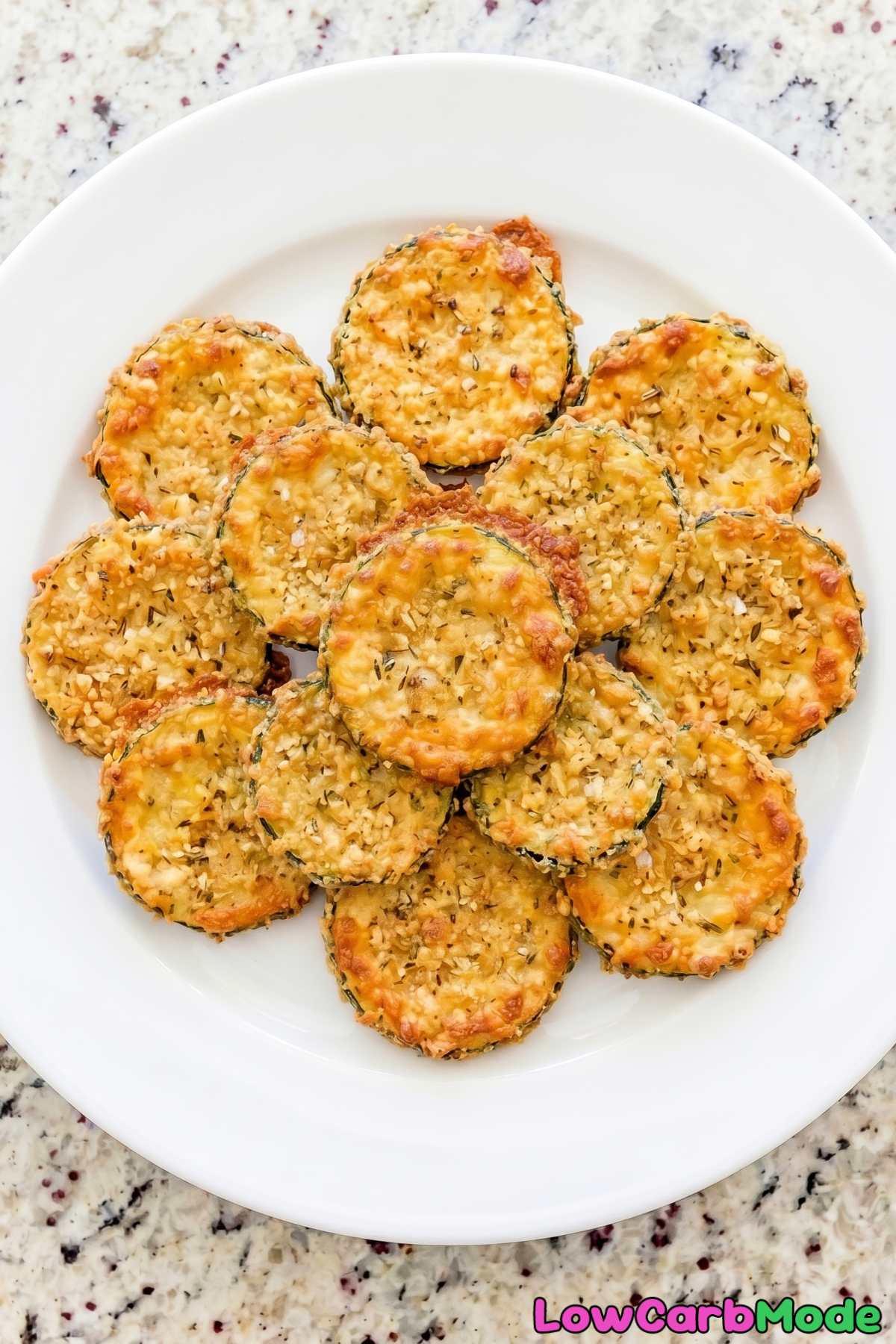 Crunchy keto zucchini parmesan crisps on tray