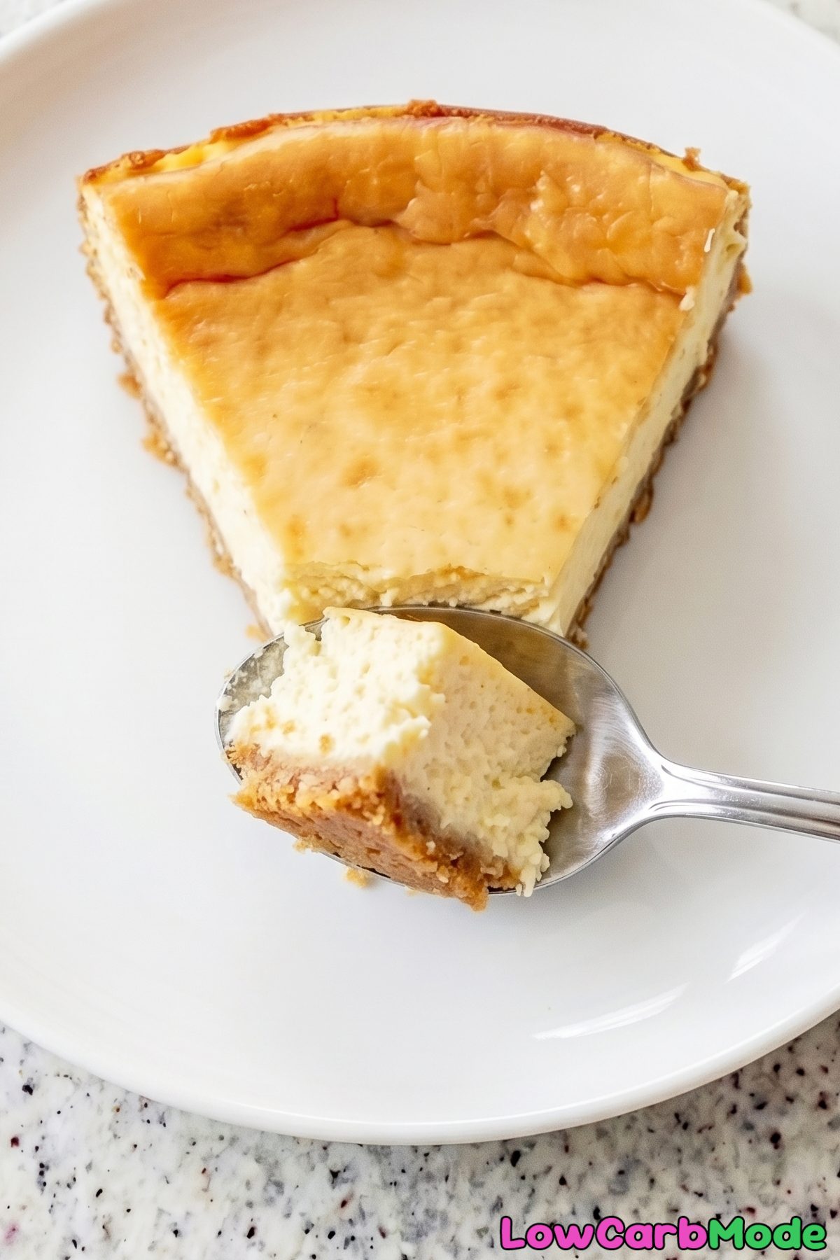 Velvety low carb New York cheesecake slice